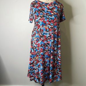 LuLaRoe Black background w/flowers Carly